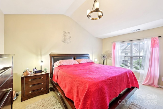 14018 Drake Watch Ln, Charlotte, NC 28262 - bedroom featuring carpet flooring, lofted ceiling, and a chandelier