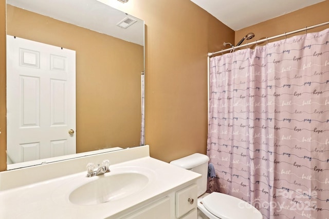 14018 Drake Watch Ln, Charlotte, NC 28262 - full bath featuring toilet, vanity, and curtained shower