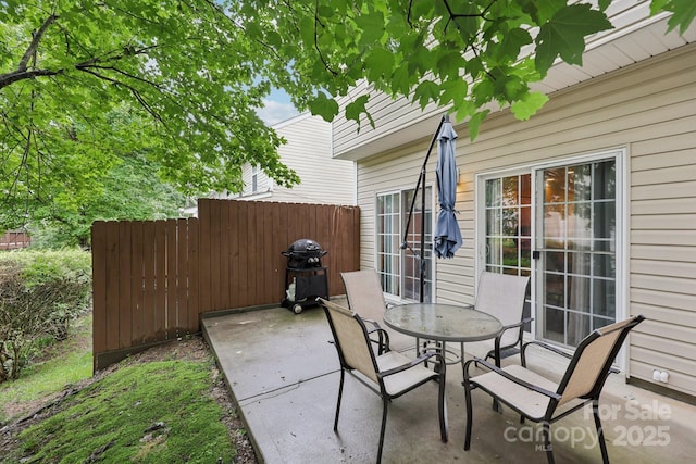 14018 Drake Watch Ln, Charlotte, NC 28262 - view of patio featuring grilling area and outdoor dining area