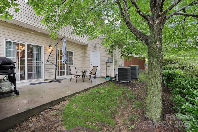 14018 Drake Watch Ln, Charlotte, NC 28262 - view of patio / terrace with central AC unit