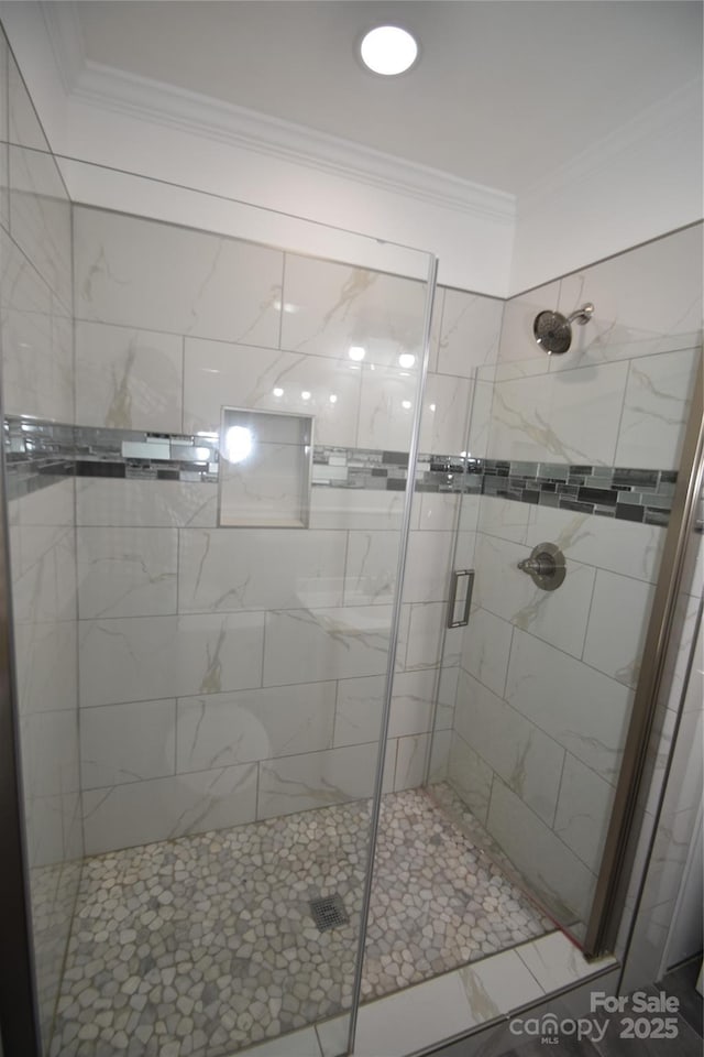 706 Mcintyre St, Monroe, NC 28110 - full bathroom featuring a stall shower and ornamental molding