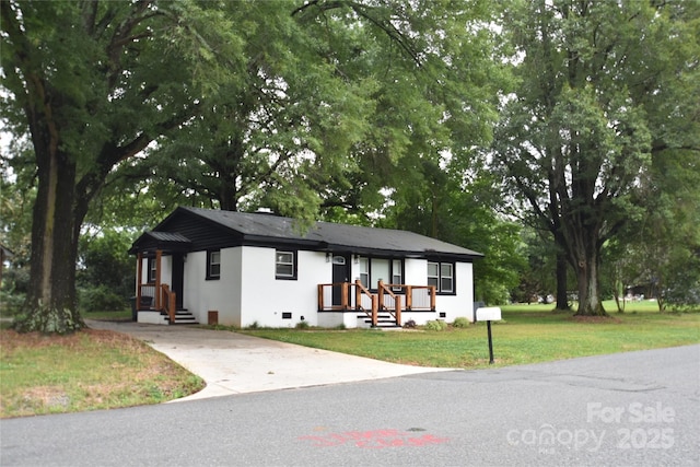 706 Mcintyre St, Monroe, NC 28110 - ranch-style home with concrete driveway and a front yard