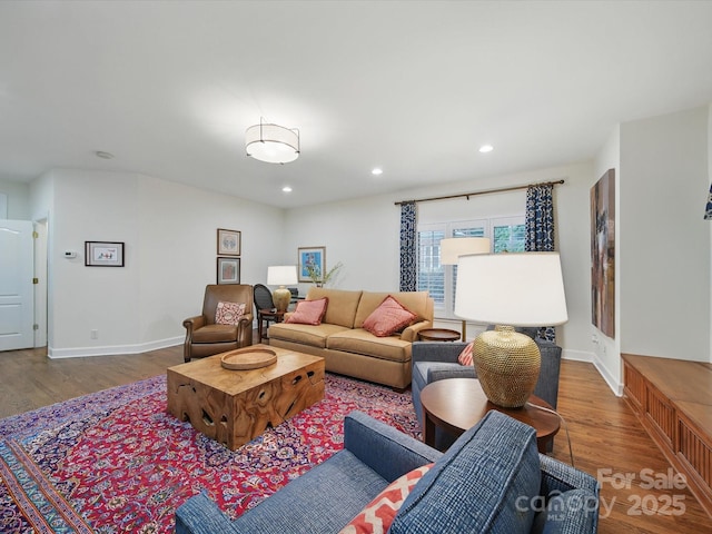 4644 Snow Dr, Harrisburg, NC 28075 - living room with wood finished floors, recessed lighting, and baseboards
