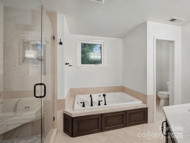 4644 Snow Dr, Harrisburg, NC 28075 - full bathroom featuring toilet, a bath, a stall shower, and vanity