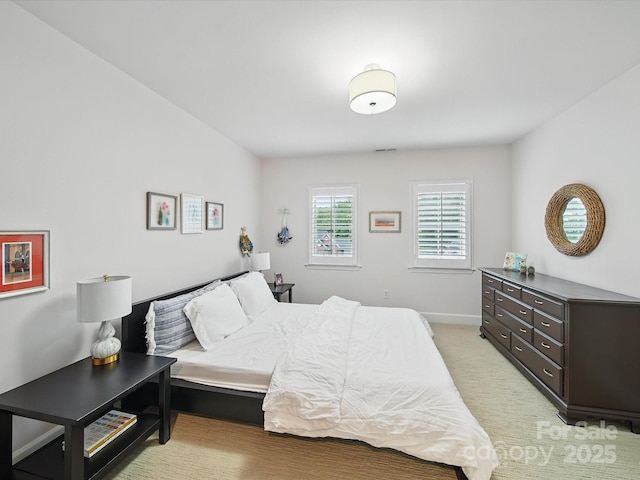 4644 Snow Dr, Harrisburg, NC 28075 - bedroom with light carpet and baseboards