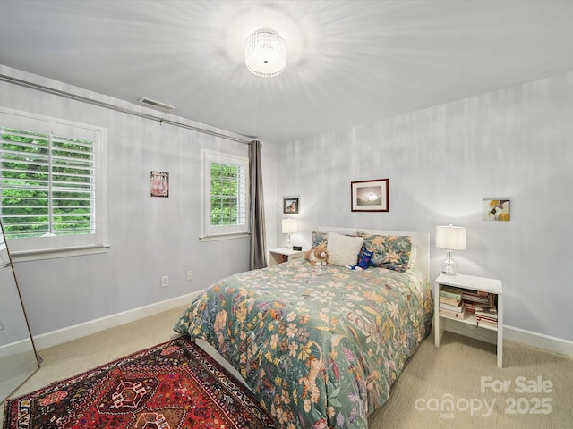 4644 Snow Dr, Harrisburg, NC 28075 - carpeted bedroom with baseboards