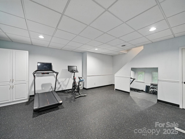 4644 Snow Dr, Harrisburg, NC 28075 - exercise room with baseboards, recessed lighting, and a paneled ceiling