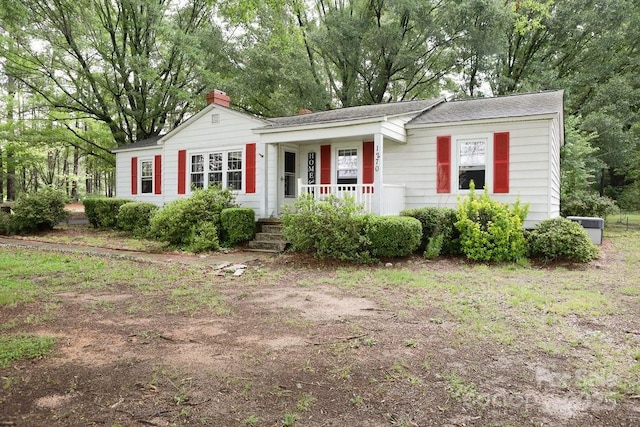 1270 N Enochville Ave, China Grove, NC 28023 - ranch-style home with a porch and a chimney