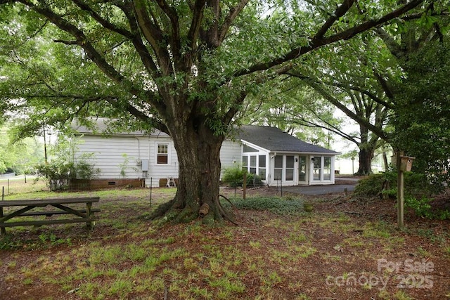 1270 N Enochville Ave, China Grove, NC 28023 - view of yard featuring a sunroom