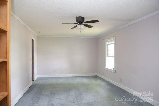 1270 N Enochville Ave, China Grove, NC 28023 - carpeted spare room featuring ceiling fan, ornamental molding, and baseboards
