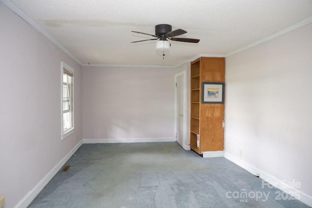 1270 N Enochville Ave, China Grove, NC 28023 - carpeted spare room featuring ornamental molding, ceiling fan, and baseboards
