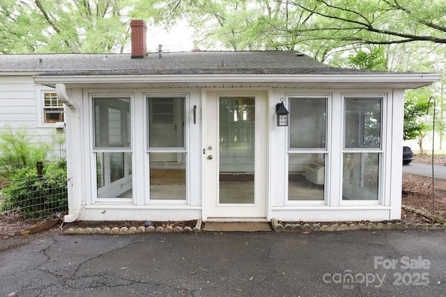 1270 N Enochville Ave, China Grove, NC 28023 - property entrance with a chimney and a shingled roof