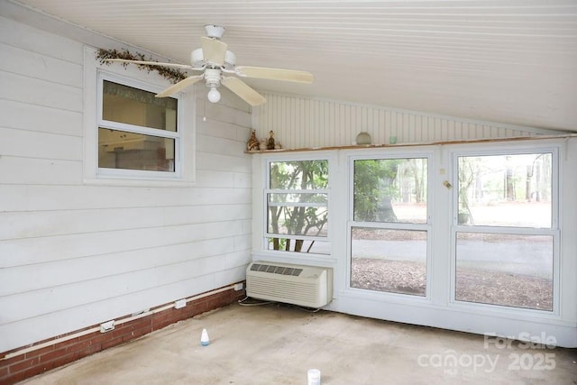 1270 N Enochville Ave, China Grove, NC 28023 - unfurnished sunroom featuring an AC wall unit and vaulted ceiling