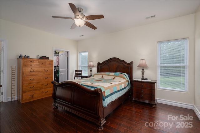 3103 Richview Dr, Crouse, NC 28033 - bedroom with a spacious closet, dark wood-style floors, a closet, and baseboards