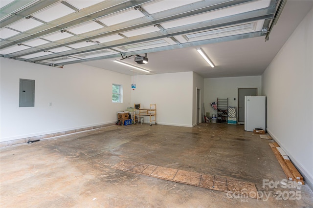 3103 Richview Dr, Crouse, NC 28033 - garage featuring electric panel, a garage door opener, baseboards, and freestanding refrigerator
