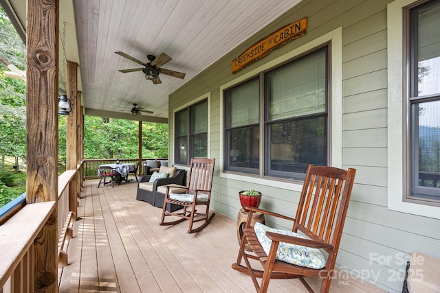 305 Pound Mill Branch Rd, Green Mountain, NC 28740 - wooden porch with ceiling fan