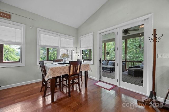 305 Pound Mill Branch Rd, Green Mountain, NC 28740 - dining area featuring lofted ceiling, dark wood-type flooring, and baseboards