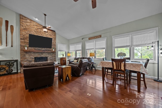 305 Pound Mill Branch Rd, Green Mountain, NC 28740 - living room featuring wood-type flooring, a ceiling fan, a fireplace, high vaulted ceiling, and baseboards