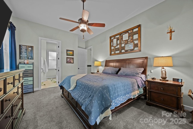 305 Pound Mill Branch Rd, Green Mountain, NC 28740 - carpeted bedroom featuring baseboards, ceiling fan, and ensuite bath