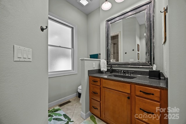 305 Pound Mill Branch Rd, Green Mountain, NC 28740 - full bath featuring toilet, vanity, tile patterned flooring, a shower, and baseboards