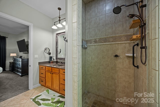 305 Pound Mill Branch Rd, Green Mountain, NC 28740 - bathroom with tiled shower, vanity, and tile patterned floors