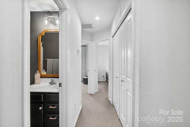 999 Rushing Ln Unit 13, Fort Mill, SC 29715 - hall featuring a sink and carpet flooring