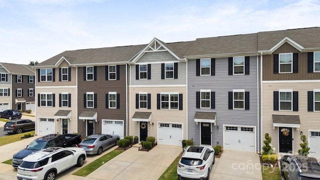 999 Rushing Ln Unit 13, Fort Mill, SC 29715 - view of property with driveway and a garage