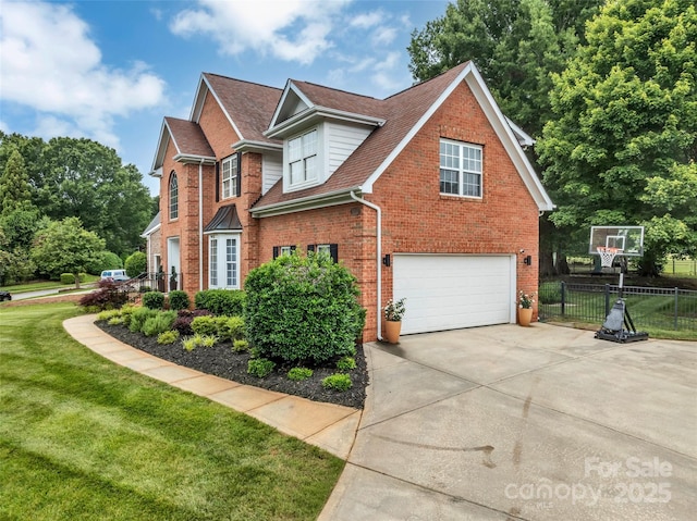 15737 Agincourt Dr, Huntersville, NC 28078 - view of front of home featuring an attached garage, brick siding, concrete driveway, and roof with shingles