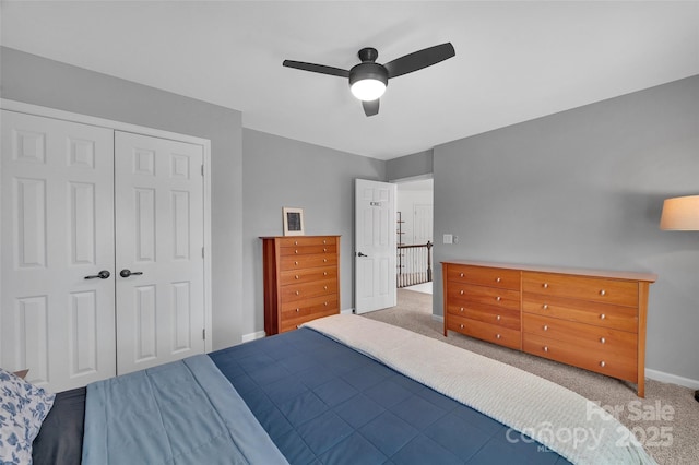 15737 Agincourt Dr, Huntersville, NC 28078 - bedroom featuring carpet floors, a closet, baseboards, and ceiling fan