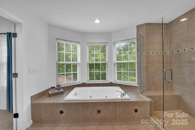 15737 Agincourt Dr, Huntersville, NC 28078 - full bath with a jetted tub, plenty of natural light, a shower stall, and tile patterned floors