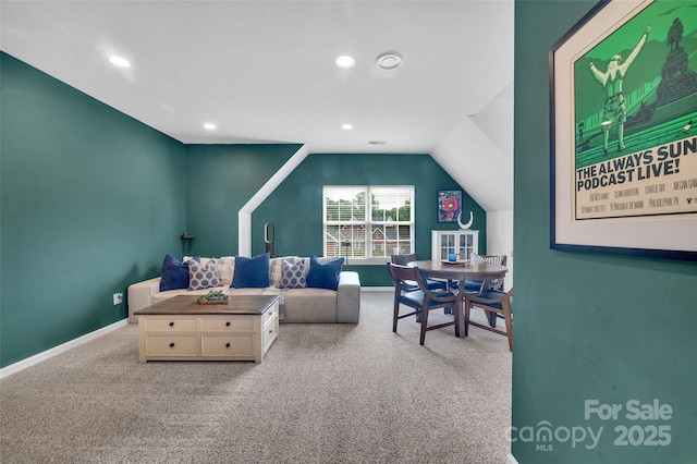 15737 Agincourt Dr, Huntersville, NC 28078 - carpeted living area with lofted ceiling, baseboards, and recessed lighting