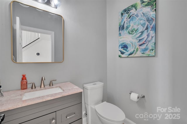 15737 Agincourt Dr, Huntersville, NC 28078 - bathroom featuring toilet, vanity, and baseboards