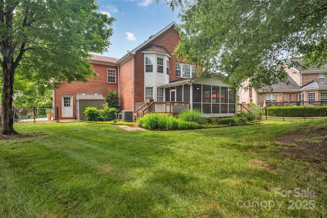 15737 Agincourt Dr, Huntersville, NC 28078 - back of house with a sunroom, brick siding, and central AC