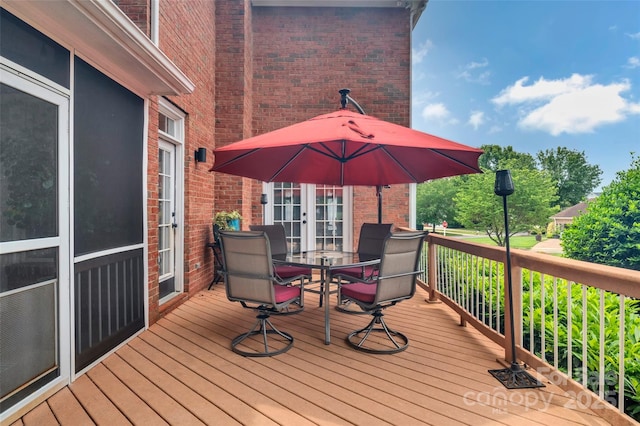 15737 Agincourt Dr, Huntersville, NC 28078 - wooden deck featuring french doors and outdoor dining area