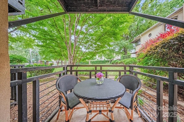 201 N Dotger Ave Unit C8, Charlotte, NC 28207 - balcony with outdoor dining area