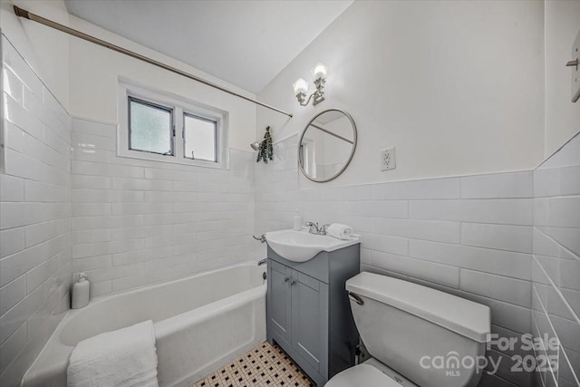 201 N Dotger Ave Unit C8, Charlotte, NC 28207 - full bathroom featuring toilet, vanity, tile walls, wainscoting, and shower / bathtub combination