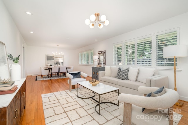 5424 Doncaster Dr, Charlotte, NC 28211 - living area with a chandelier, light wood-style floors, and recessed lighting