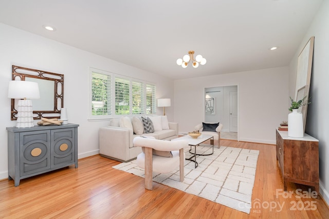 5424 Doncaster Dr, Charlotte, NC 28211 - living room featuring light wood-style flooring and a chandelier