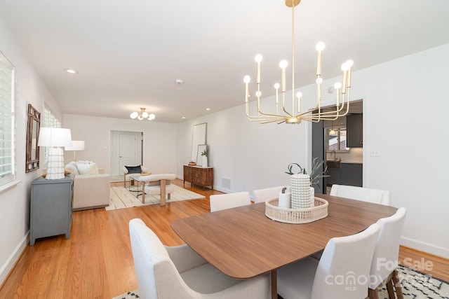 5424 Doncaster Dr, Charlotte, NC 28211 - dining space featuring a chandelier and light wood-type flooring