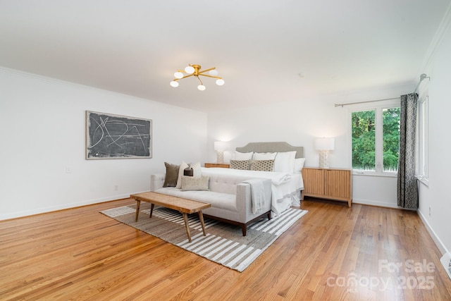 5424 Doncaster Dr, Charlotte, NC 28211 - bedroom with light wood-style flooring, ornamental molding, and a chandelier