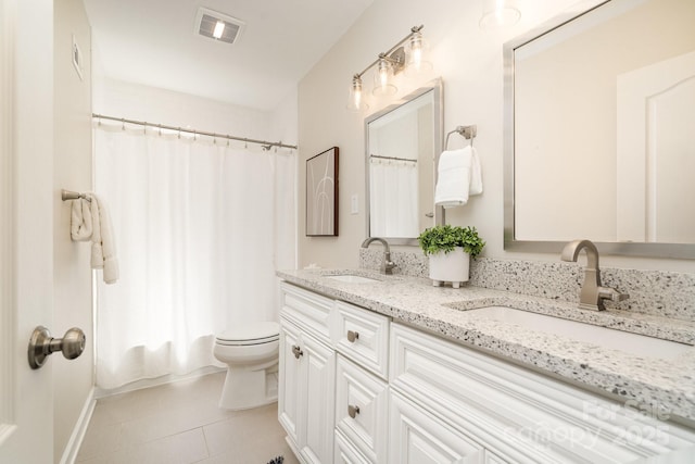 5424 Doncaster Dr, Charlotte, NC 28211 - full bathroom with double vanity and tile patterned flooring