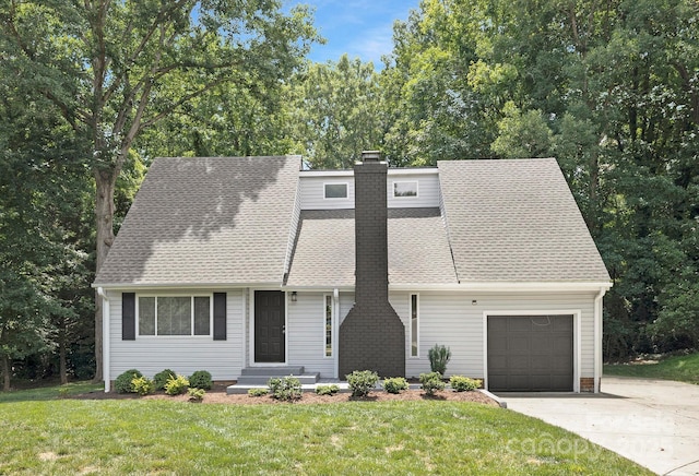 10101 Wood Ct, Charlotte, NC 28277 - view of front of house with concrete driveway, an attached garage, a front lawn, and a shingled roof