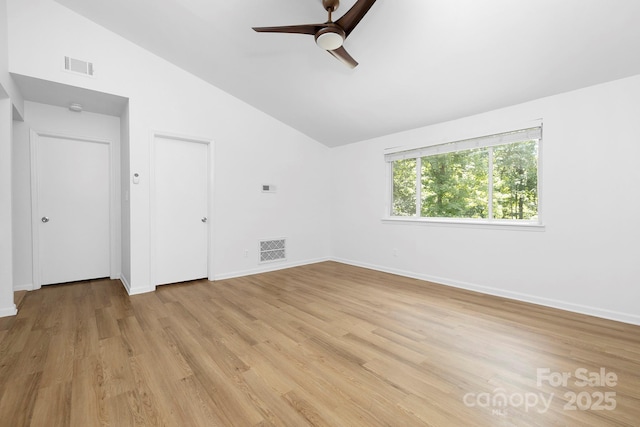 10101 Wood Ct, Charlotte, NC 28277 - empty room featuring lofted ceiling, ceiling fan, and light wood finished floors