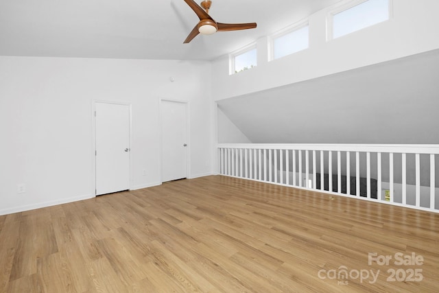 10101 Wood Ct, Charlotte, NC 28277 - additional living space with ceiling fan, vaulted ceiling, and wood finished floors