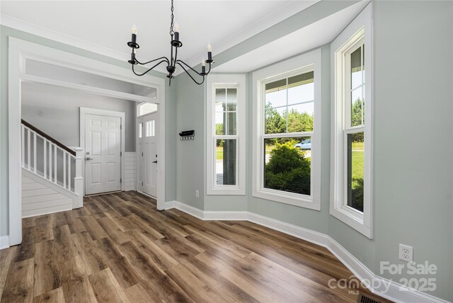 3902 Mcgee Point Rd, Terrell, NC 28682 - entrance foyer with a chandelier, baseboards, and plenty of natural light