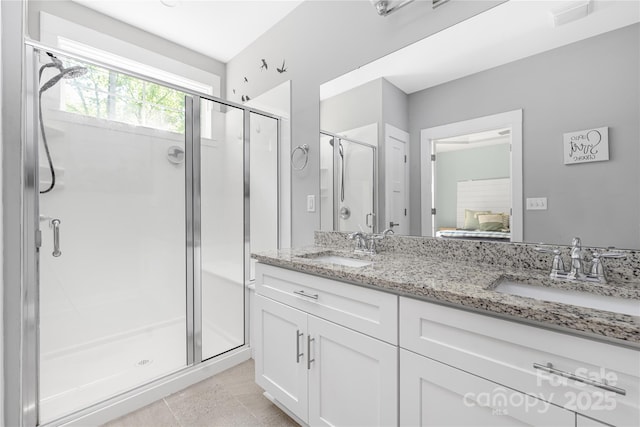 3902 Mcgee Point Rd, Terrell, NC 28682 - ensuite bathroom featuring a stall shower, double vanity, and tile patterned floors