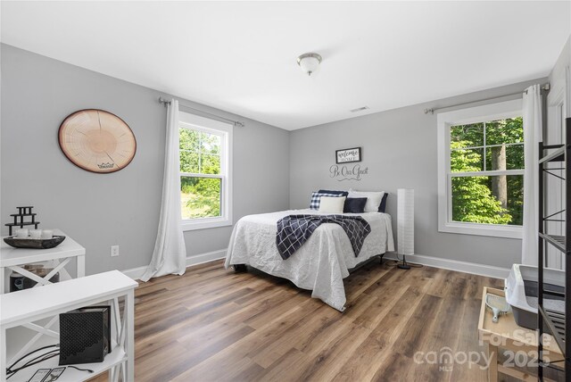 3902 Mcgee Point Rd, Terrell, NC 28682 - bedroom with wood finished floors and baseboards