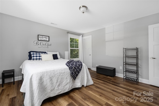 3902 Mcgee Point Rd, Terrell, NC 28682 - bedroom with dark wood-type flooring and baseboards
