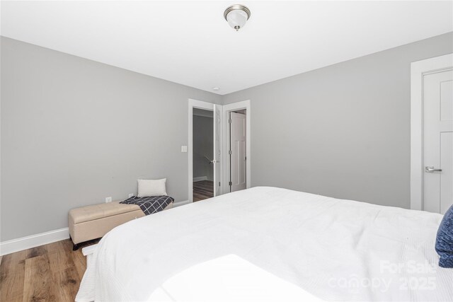3902 Mcgee Point Rd, Terrell, NC 28682 - bedroom with wood finished floors and baseboards