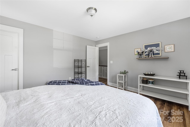 3902 Mcgee Point Rd, Terrell, NC 28682 - bedroom with dark wood-style floors and baseboards